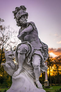 Low angle view of statue against sky