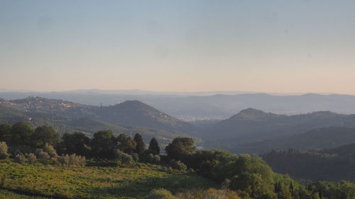 Scenic view of mountains against sky during sunset