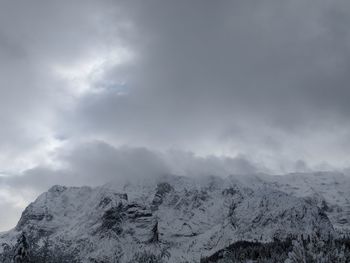 Scenic view of mountains against sky during winter