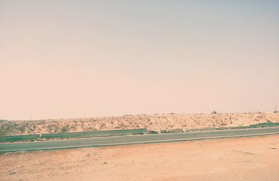 Scenic view of beach against clear sky