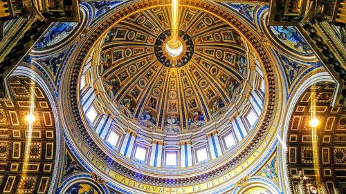 Low angle view of illuminated ceiling