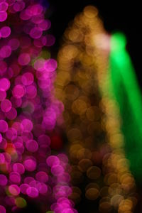 Defocused image of illuminated christmas lights