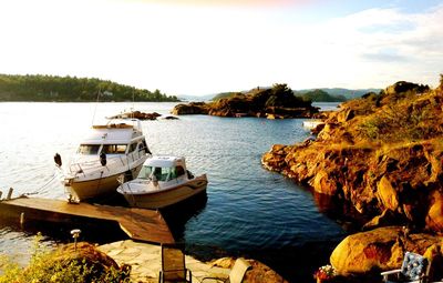 Panoramic view of sea and rocks against sky