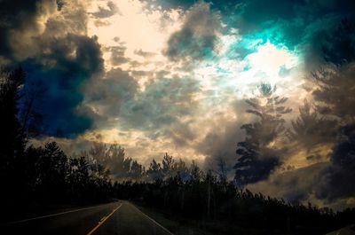 Empty road at sunset