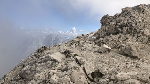 Rock formations on mountain against sky