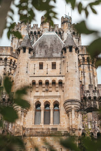 Low angle view of old building against sky