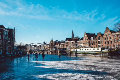 View of buildings in city during winter