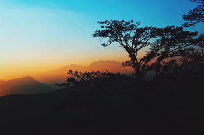 Scenic view of mountains at sunset