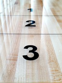 High angle view of black sign on table