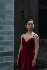 Portrait of a young woman looking away