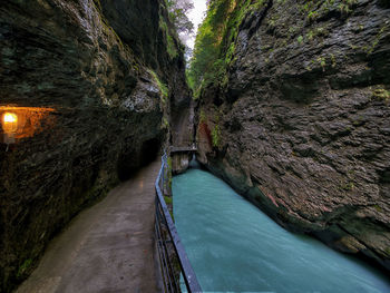 Scenic view of river amidst rocks