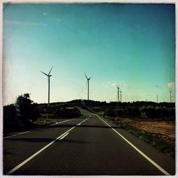 Country road passing through landscape