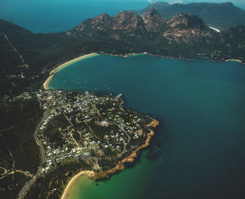 High angle view of sea and city