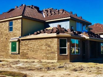 Exterior of old building against blue sky