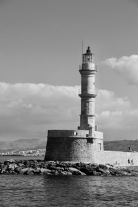 Lighthouse in old port of chania in crete, ancient greece 