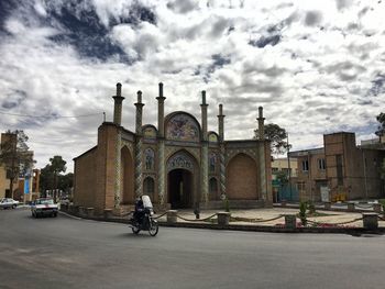 Monument against cloudy sky