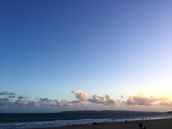 View of calm sea against blue sky