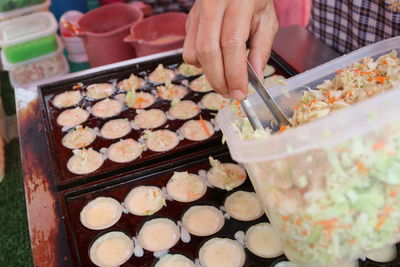 Close-up of hand holding food