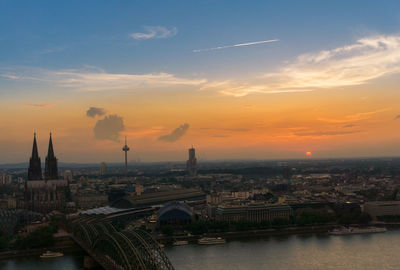 Aerial view of city at sunset