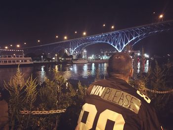 Illuminated bridge at night