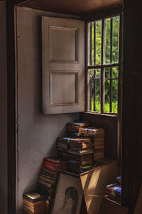 Close-up of books on window