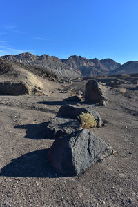 Shadow of person on rock