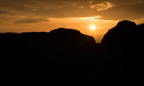 Scenic view of mountains during sunset