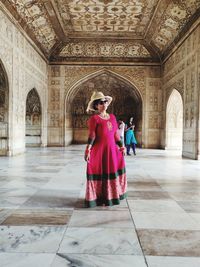 Woman standing in building