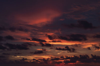 Low angle view of dramatic sky during sunset