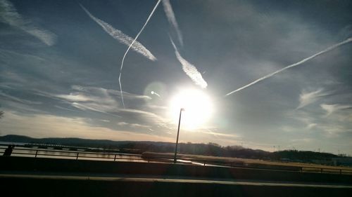View of road against cloudy sky