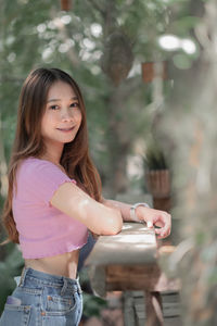 Portrait of young woman looking away