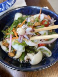 High angle view of chopped vegetables in bowl on table