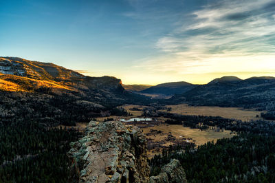 Scenic view of mountains against sky during sunset