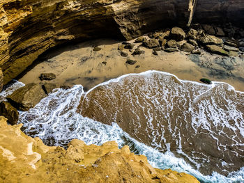 High angle view of rocks in the sea