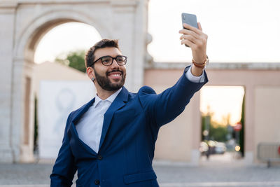 Young man using mobile phone