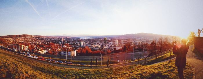 Panoramic shot of cityscape against clear sky