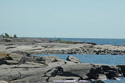 Scenic view of sea against clear sky