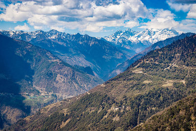 Himalaya mountain valley with bright blue sky at day from hilltop