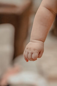 Low section of child on hand