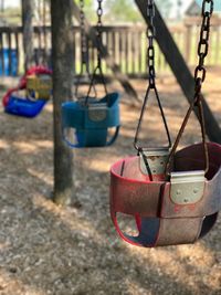 Close-up of swing at playground