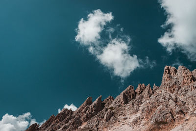 Low angle view of rocks against sky