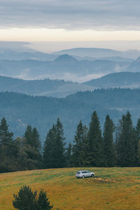 Scenic view of mountains against sky during sunset
