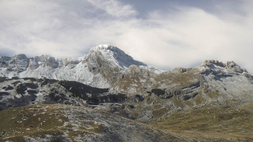 Low angle view of mountains against sky