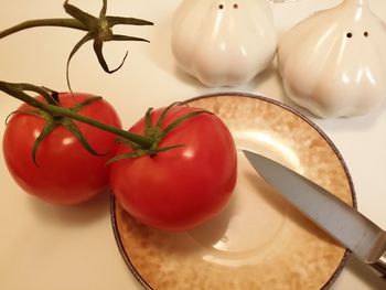 Close-up of cherries on table