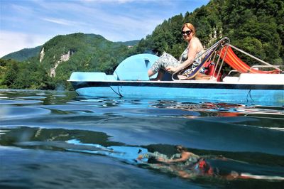 Portrait of woman boating in lake