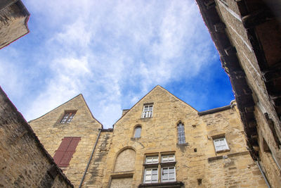 Low angle view of old building against sky