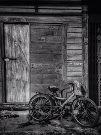 Bicycle leaning on wall