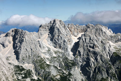 Scenic view of mountains against sky during winter