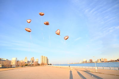 Scenic view of beach against blue sky