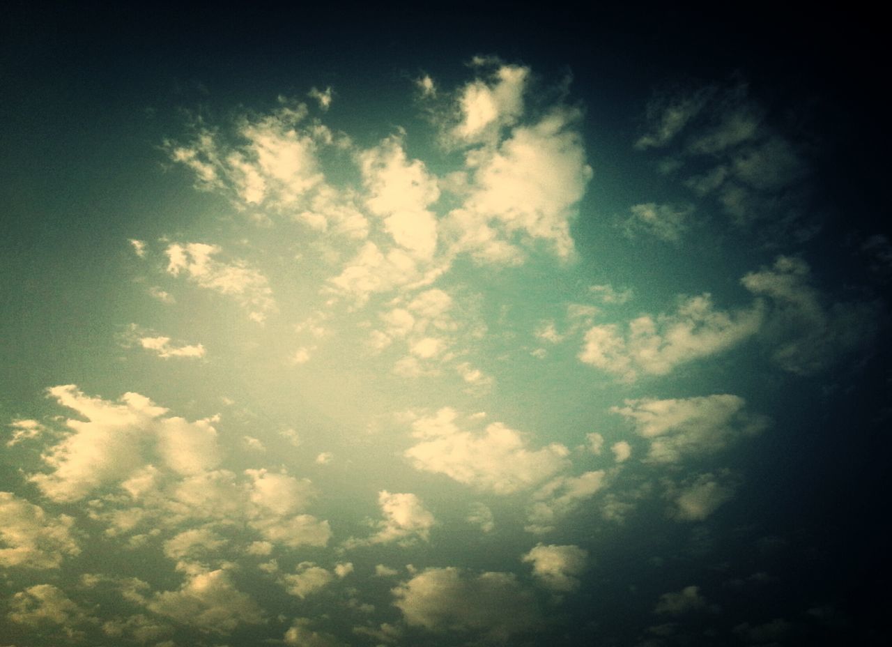 low angle view, sky, cloud - sky, beauty in nature, tranquility, nature, scenics, cloudy, tranquil scene, sky only, backgrounds, cloud, idyllic, outdoors, cloudscape, no people, full frame, day, blue, weather